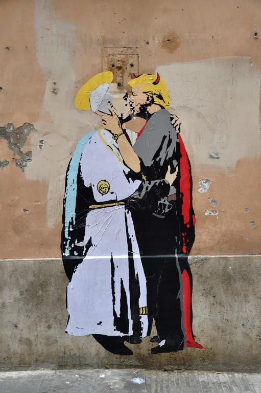 ITALY-FEATURE-STREET-ART-POPE-TRUMP