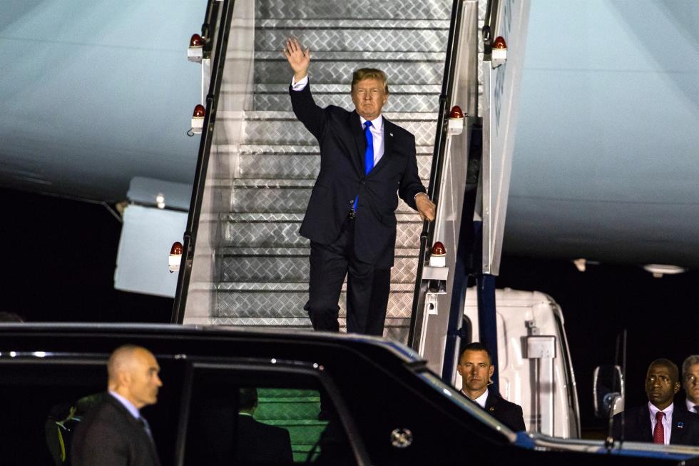 President Trump arrives in Singapore for US-North Korea Summit