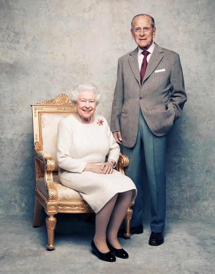 A handout photo shows Britains Queen Elizabeth and Prince Philip in the White Drawing Room at Windsor Castle