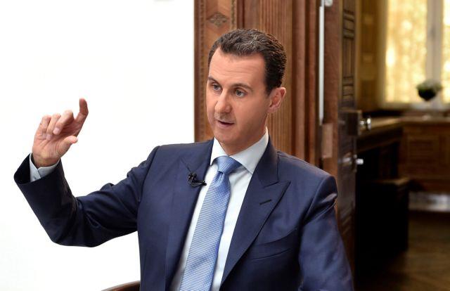 Syrias President Bashar al-Assad speaks during an interview with Croatian newspaper Vecernji List in Damascus