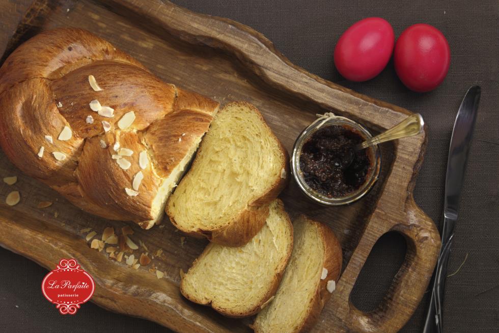 Easter sweet brioche on wooden tray