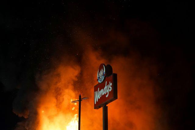 A Wendy’s burns following a rally against racial inequality and the police shooting death of Rayshard Brooks, in Atlanta