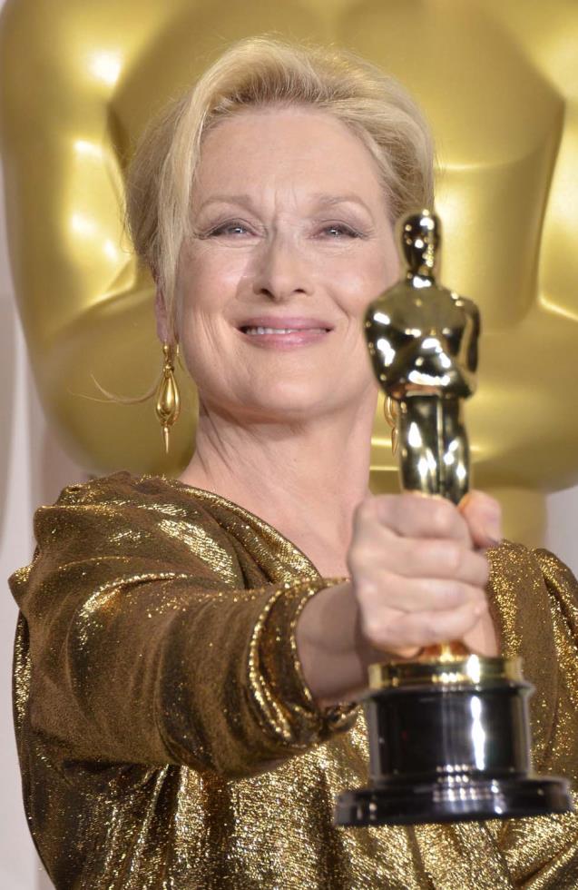 Actress Meryl Streep holds her Oscar for