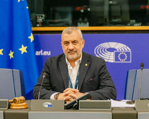 &Tau;&omicron; &nu;έ&omicron; &Sigma;ύ&mu;&phi;&omega;&nu;&omicron; &gamma;&iota;&alpha; &tau;&eta; &Mu;&epsilon;&tau;&alpha;&nu;ά&sigma;&tau;&epsilon;&upsilon;&sigma;&eta; &kappa;&alpha;&iota; &tau;&omicron; Ά&sigma;&upsilon;&lambda;&omicron; &phi;έ&rho;&epsilon;&iota; &tau;&eta; &sigma;&phi;&rho;&alpha;&gamma;ί&delta;&alpha; &tau;&omicron;&upsilon; &Epsilon;&Lambda;&Kappa;-&Kappa;&alpha;&theta;&omicron;&rho;&iota;&sigma;&tau;&iota;&kappa;ό&sigmaf; &omicron; &rho;ό&lambda;&omicron;&sigmaf; &tau;&omicron;&upsilon; &Lambda;&omicron;&upsilon;&kappa;ά &Phi;&omicron;&upsilon;&rho;&lambda;ά